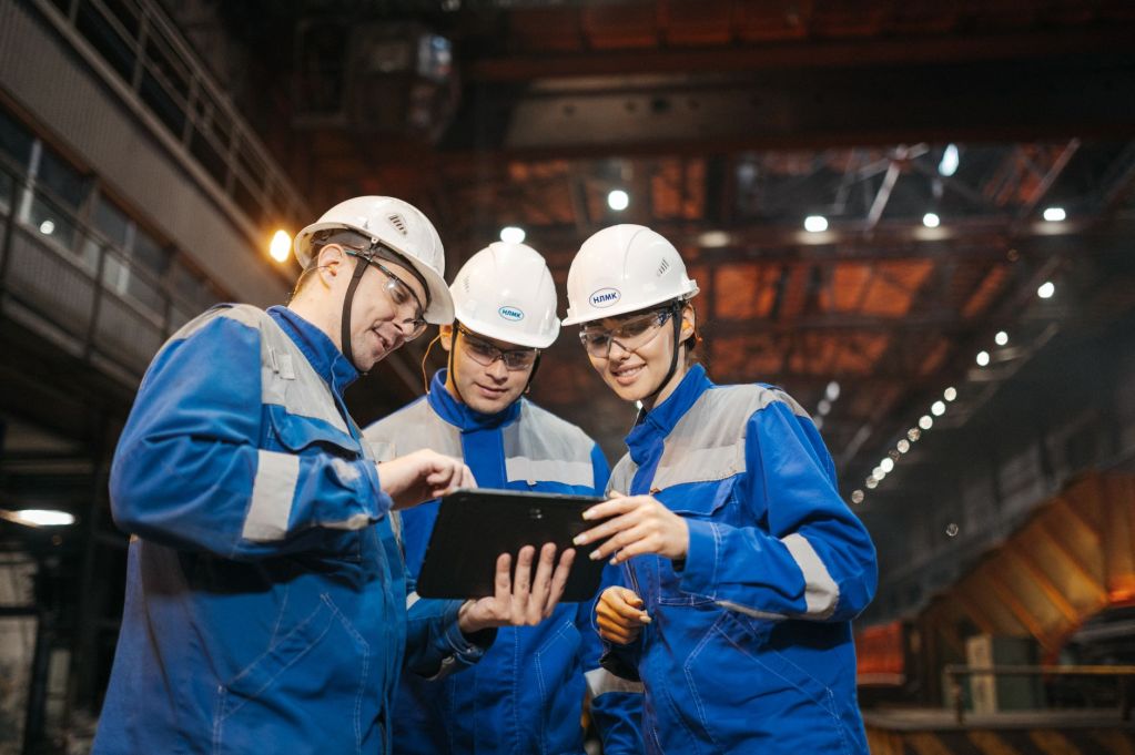 industrial engineers collaborating in factory